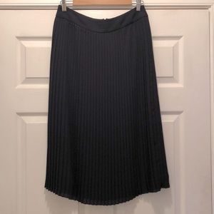Navy, knee/midi length, pleated skirt